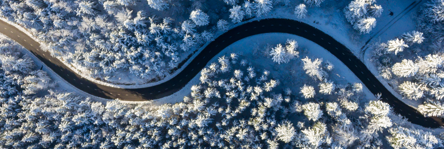 winding winter road with snow