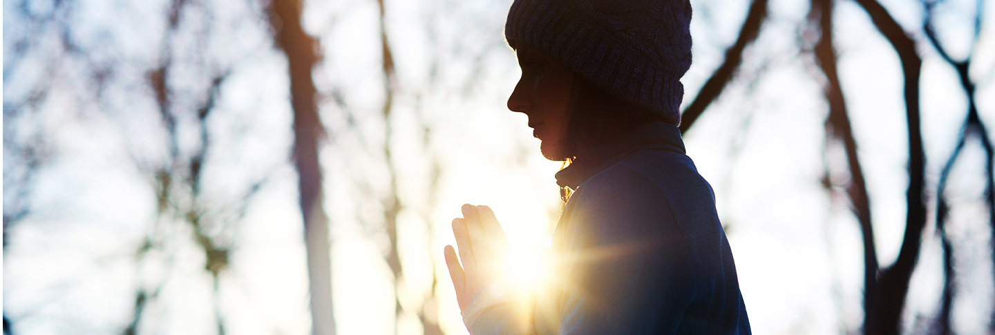 Woman in yoga pose in outdoor setting